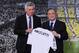 MADRID, SPAIN - JUNE 26: Carlo Ancelotti (L) holds up a Real Madrid shirt as he stands alongside president Florentino Perez while being presented as the new head coach of Real Madrid at Estadio Bernabeu on June 26, 2013 in Madrid, Spain. (Photo by Denis