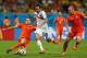 SALVADOR, BRAZIL - JULY 05: Stefan De Vrij (L) of the Netherlands tackles Marcos Urena of Costa Rica as Ron Vlaar closes in during the 2014 FIFA World Cup Brazil Quarter Final match between the Netherlands and Costa Rica at Arena Fonte Nova on July 5, 2