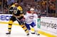 BOSTON, MA - MAY 14: Zdeno Chara #33 of the Boston Bruins and Brendan Gallagher #11 of the Montreal Canadiens battle behind the net during Game Seven of the Second Round of the 2014 NHL Stanley Cup Playoffs at the TD Garden on May 14, 2014 in Boston, Mass