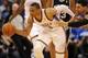 May 27, 2014; Oklahoma City, OK, USA; Oklahoma City Thunder guard Russell Westbrook (0) steals the ball from San Antonio Spurs guard Danny Green (4) during the second quarter in game four of the Western Conference Finals of the 2014 NBA Playoffs at Chesap