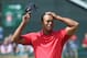 HOYLAKE, ENGLAND - JULY 20: Tiger Woods of the United States reacts on the 18th green during the final round of The 143rd Open Championship at Royal Liverpool on July 20, 2014 in Hoylake, England. (Photo by Andrew Redington/Getty Images)