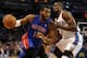 Apr 16, 2014; Oklahoma City, OK, USA; Detroit Pistons forward Greg Monroe (10) drives to the basket against Oklahoma City Thunder forward Serge Ibaka (9) during the first quarter at Chesapeake Energy Arena. Mandatory Credit: Mark D. Smith-USA TODAY Sport