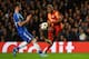 LONDON, ENGLAND - MARCH 18: Didier Drogba of Galatasaray shoots past Gary Cahill of Chelsea during the UEFA Champions League Round of 16 second leg match between Chelsea and Galatasaray AS at Stamford Bridge on March 18, 2014 in London, England. (Photo