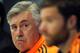 MADRID, SPAIN - APRIL 22: Head coach Carlo Ancelotti (L) of Real Madrid FC listens to a question beside Real player Xabi Alonso during their press conference at Valdebebas training ground ahead of the UEFA Champions League semi-final first leg match agai