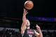 LAS VEGAS, NV - JULY 21: Donatas Motiejunas #20 of the Houston Rockets shoots against the Sacramento Kings during the Samsung NBA Summer League 2014 on July 21, 2014 at the Thomas & Mack Center in Las Vegas, Nevada. NOTE TO USER: User expressly acknowledg