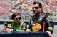 BROOKLYN, MI - JUNE 15: Danica Patrick, driver of the #10 GoDaddy Chevrolet, and Tony Stewart, driver of the #14 Bass Pro Shops / Mobil 1 Chevrolet, ride down pit road prior to the NASCAR Sprint Cup Series Quicken Loans 400 at Michigan International Spee