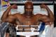 LAS VEGAS - APRIL 09: Boxer Evander Holyfield poses on the scale during the official weigh-in for his bout against Francois Botha at the Thomas & Mack Center April 9, 2010 in Las Vegas, Nevada. The two will meet in a heavyweight bout on April 10 in Las V