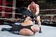Brock Lesnar attacks Big Show with a steel chair at the Royal Rumble.