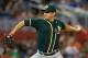 MIAMI, FL - JUNE 29: Tommy Milone #57 of the Oakland Athletics pitches during a game against the Miami Marlins at Marlins Park on June 29, 2014 in Miami, Florida. (Photo by Mike Ehrmann/Getty Images)