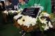 Wreaths were laid on the seats that would have been occupied by Liam Sweeney and John Alder.