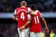 LONDON, ENGLAND - OCTOBER 19: Per Mertesacker and Mesut Oezil of Arsenal celebrate during the Barclays Premier League match between Arsenal and Norwich City at Emirates Stadium on October 19, 2013 in London, England. (Photo by Paul Gilham/Getty Images)