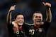 CAPE TOWN, SOUTH AFRICA - JULY 03: Mesut Oezil and Lukas Podolski of Germany celebrate victory following the 2010 FIFA World Cup South Africa Quarter Final match between Argentina and Germany at Green Point Stadium on July 3, 2010 in Cape Town, South Afr