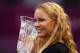 DOHA, QATAR - OCTOBER 29: Caroline Wozniacki of Denmark receives the WTA Year- End No 1 Trophy on during day four of the WTA Championships at the Khalifa Tennis Complex on October 29, 2010 in Doha, Qatar. (Photo by Bryn Lennon/Getty Images)