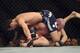 Apr 26, 2014; Baltimore, MD, USA; Luke Rockhold (red gloves) fights against Tim Boetschat during UFC 172 at Baltimore Arena. Mandatory Credit: Tommy Gilligan-USA TODAY Sports