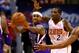 Dec 13, 2013; Phoenix, AZ, USA; Sacramento Kings guard Isaiah Thomas (left) passes the ball against Phoenix Suns guard Eric Bledsoe at US Airways Center. The Suns defeated the Kings 116-107. Mandatory Credit: Mark J. Rebilas-USA TODAY Sports