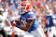 Nov 9, 2013; Gainesville, FL, USA; Florida Gators running back Valdez Showers (10) runs with the ball against the Vanderbilt Commodores during the first quarter at Ben Hill Griffin Stadium. Mandatory Credit: Kim Klement-USA TODAY Sports