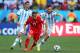 SAO PAULO, BRAZIL - JULY 01: Xherdan Shaqiri of Switzerland is challenged by Angel di Maria (L) and Jose Maria Basanta of Argentina during the 2014 FIFA World Cup Brazil Round of 16 match between Argentina and Switzerland at Arena de Sao Paulo on July 1