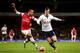LONDON, ENGLAND - JANUARY 04: Theo Walcott of Arsenal and Vlad Chiriches of Spurs compete for the ball during the Budweiser FA Cup match between Arsenal and Tottenham Hotspur at Emirates Stadium on January 4, 2014 in London, England. (Photo by Clive Ros