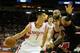 Nov 21, 2012; Houston, TX, USA; Houston Rockets point guard Jeremy Lin (7) dribbles past Chicago Bulls power forward Carlos Boozer (5) during the first quarter at the Toyota Center. Mandatory Credit: Thomas Campbell-USA TODAY Sports