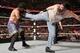 Luke Harper hits a superkick.