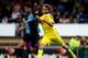 HIGH WYCOMBE, ENGLAND - JULY 16: Marco van Ginkel of Chelsea battles with Aaron Pierre of Wycombe duing the pre season friendly match between Wycombe Wanderers and Chelsea at Adams Park on July 16, 2014 in High Wycombe, England. (Photo by Ben Hoskins/Get