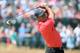 HOYLAKE, ENGLAND - JULY 20: Tiger Woods of the United States hits his second shot on the 18th hole during the final round of The 143rd Open Championship at Royal Liverpool on July 20, 2014 in Hoylake, England. (Photo by Andrew Redington/Getty Images)