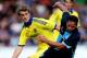 HIGH WYCOMBE, ENGLAND - JULY 16: Sam Wood of Wycombe holds off the challenge of Marco van Ginkel of Chelsea duing the pre season friendly match between Wycombe Wanderers and Chelsea at Adams Park on July 16, 2014 in High Wycombe, England. (Photo by Ben