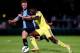 HIGH WYCOMBE, ENGLAND - JULY 16: Jeremie Boga of Chelsea advances under pressure from Nathan Evans of Wycombe duing the pre season friendly match between Wycombe Wanderers and Chelsea at Adams Park on July 16, 2014 in High Wycombe, England. (Photo by Ben