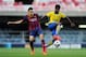 BARCELONA, SPAIN - MARCH 18: Gedion Zelalem of Arsenal duels for the ball with Munir El Haddadi of FC Barcelona during the UEFA Youth League Quarter FInal match between FC Barcelona U19 and Arsenal U19 at Mini Estadi on March 18, 2014 in Barcelona, Spain