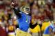 LOS ANGELES, CA - NOVEMBER 30: Quarterback Brett Hundley #17 of the UCLA Bruins throws a pass against the USC Trojans at Los Angeles Coliseum on November 30, 2013 in Los Angeles, California. (Photo by Stephen Dunn/Getty Images)