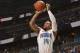 ORLANDO, FL - APRIL 11: Jameer Nelson #14 of the Orlando Magic shoots the ball against the Washington Wizards during the game on April 11, 2014 at Amway Center in Orlando, Florida. NOTE TO USER: User expressly acknowledges and agrees that, by downloading