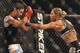 SAN JOSE, CA - AUGUST 15: Cris Cyborg (R) battles Gina Carano during their Middleweight Championship fight at Stikeforce: Carano vs. Cyborg on August 15, 2009 in San Jose, California. (Photo by Jon Kopaloff/Getty Images)