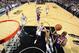 SAN ANTONIO, TX - April 16: Jodie Meeks #20 of the Los Angeles Lakers goes up for a shot against the San Antonio Spurs during the game at the AT&T Center on April 16, 2014 in San Antonio, Texas. NOTE TO USER: User expressly acknowledges and agrees that, b