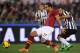 ROME, ITALY - JANUARY 21: Fabio Quagliarella (R) of Juventus FC competes for the ball with Mehdi Benatia of AS Roma during the TIM Cup match between AS Roma and Juventus FC at Olimpico Stadium on January 21, 2014 in Rome, Italy. (Photo by Paolo Bruno/Ge