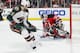 NEWARK, NJ - MARCH 20: Eric Belanger #25 of the Minnesota Wild has his shot blocked by goaltender Martin Brodeur #30 of the New Jersey Devils at the Prudential Center on March 20, 2009 in Newark, New Jersey. (Photo by Andy Marlin/NHLI via Getty Images)