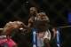 Apr 26, 2014; Baltimore, MD, USA; Anthony Johnson (right) strikes Phil Davis during their fight at Baltimore Arena. Johnson defeated Davis by judges decision. Mandatory Credit: Tommy Gilligan-USA TODAY Sports