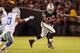 OAKLAND, CA - AUGUST 9: Running back Latavius Murray #34 of the Oakland Raiders heads to the outside against the Dallas Cowboys in the fourth quarter of a preseason game on August 9, 2013 at O.co Coliseum in Oakland, California. The Raiders won 19-17.