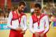 GLASGOW, SCOTLAND - JULY 24: Silver medalists Bradley Wiggins and Steven Burke of England stand on the podium during the medal ceremony for the Mens 4000 metres Team Pursuit final at Sir Chris Hoy Velodrome during day one of the Glasgow 2014 Commonwealt
