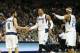 Mar 9, 2014; Dallas, TX, USA; Dallas Mavericks forward Shawn Marion (0) celebrates with guard Jose Caulderon (8) and Vince Carter (25) after a basket in the second quarter against the Indiana Pacers at American Airlines Center. Mandatory Credit: Matthew E