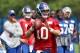Jul 22, 2014; East Rutherford, NJ, USA; New York Giants quarterback Eli Manning (10) attempts a pass during training camp at Quest Diagnostics Training Center. Mandatory Credit: Noah K. Murray-USA TODAY Sports