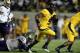 BERKELEY, CA - NOVEMBER 02: C.J. Anderson #9 of the California Golden Bears runs past John Timu #10 of the Washington Huskies at California Memorial Stadium on November 2, 2012 in Berkeley, California. (Photo by Ezra Shaw/Getty Images)