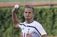 Harry Kane, pictured throwing a pitch at Wrigley Field, will want more service from his team-mates if he plays versus the Fire.