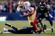 SEATTLE, WA - JANUARY 19: Wide receiver Anquan Boldin #81 of the San Francisco 49ers runs with the ball as free safety Earl Thomas #29 and cornerback Richard Sherman #25 of the Seattle Seahawks defend during the 2014 NFC Championship at CenturyLink Field