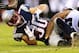 PHILADELPHIA, PA - AUGUST 09: Danny Amendola #80 of the New England Patriots is tackled in the first half against the Philadelphia Eagles on August 9, 2013 at Lincoln Financial Field in Philadelphia, Pennslyvania. (Photo by Elsa/Getty Images)