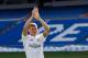 MADRID, SPAIN - JULY 17: Toni Kroos waves to fans in his new Real Madrid shirt during his official unveiling at Santiago Bernabeu Stadium on July 17, 2014 in Madrid, Spain. Toni Kroos who won the World Cup with Germany in Brazil is Real Madrid's first si