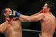 Steven Siler trades blows with Cole Miller.