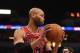 Apr 9, 2014; Minneapolis, MN, USA; Chicago Bulls forward Taj Gibson (22) grabs a rebound in the fourth quarter against the Minnesota Timberwolves at Target Center. The Bulls defeated the Wolves 102-87. Mandatory Credit: Marilyn Indahl-USA TODAY Sports
