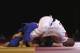GLASGOW, SCOTLAND - JULY 25: Owen Livesey of England (white) competes with Tom Reed of England (blue) in the Men's -81kg judo final at SECC Precinct during day two of the Glasgow 2014 Commonwealth Games on July 25, 2014 in Glasgow, United Kingdom. (Phot