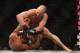 July 26, 2014; San Jose, CA, USA; Kyle Kingsbury (red gloves) defends against Patrick Cummins (blue gloves) during the light heavyweight bout of the FOX UFC Saturday at SAP Center. Mandatory Credit: Kyle Terada-USA TODAY Sports