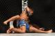 July 26, 2014; San Jose, CA, USA; Clay Guida (red gloves) is pinned down by Dennis Bermudez (blue gloves) during the featherweight bout of the FOX UFC Saturday at SAP Center. Mandatory Credit: Kyle Terada-USA TODAY Sports